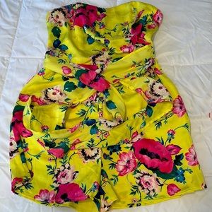 Express yellow-flowered romper with boning.
